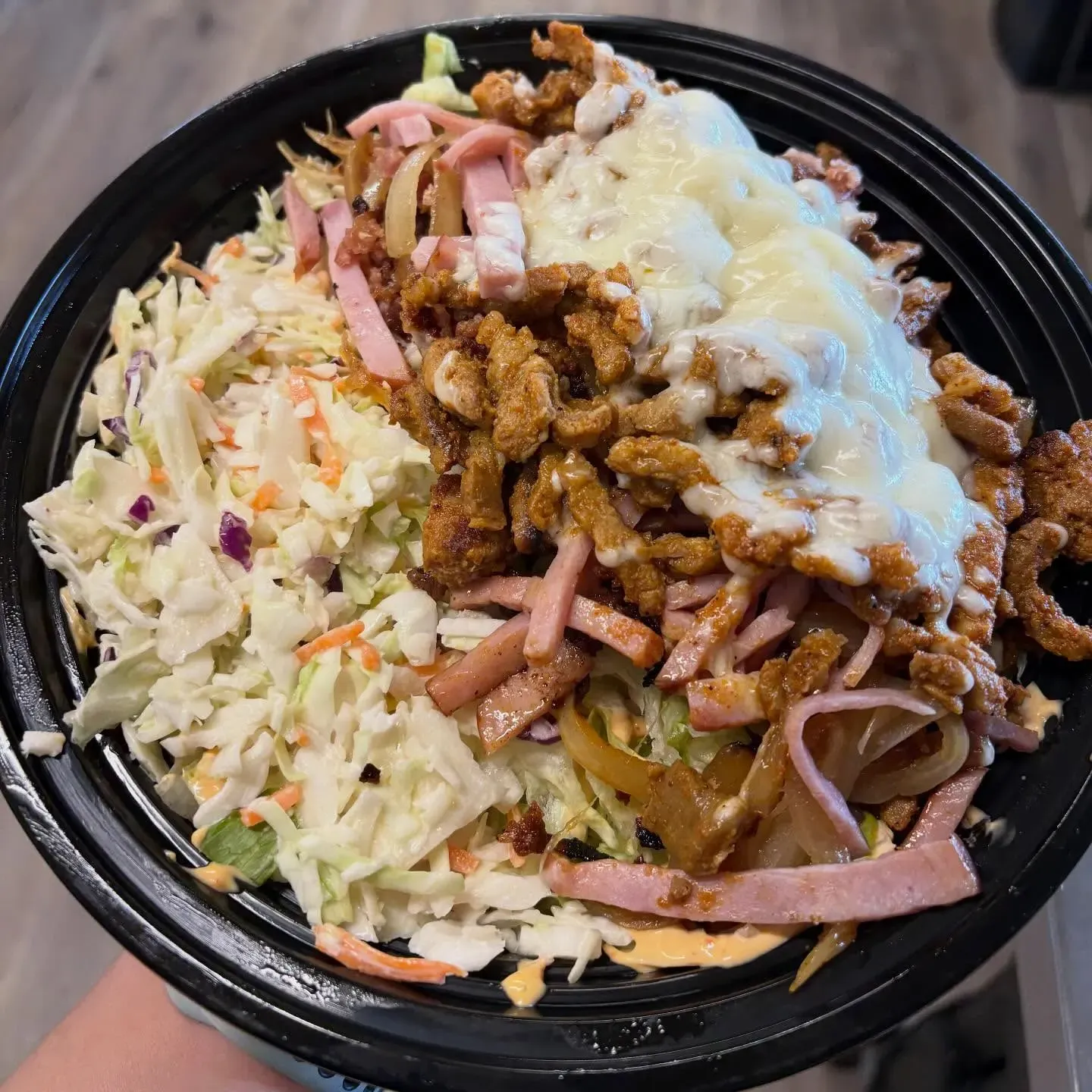 Loaded burrito bowl with slaw and grilled meat